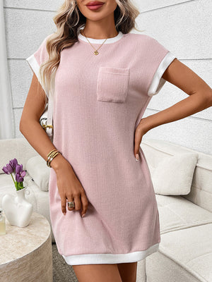 Pink ribbed knit mini dress with white trim and a chest pocket.