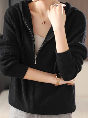 Black ribbed knit zip-through hoodie with a full zip closure and hood.