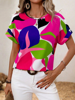 Women's abstract floral print t-shirt in multi-color with short sleeves and a crew neck.