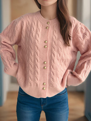 Dusty Pink cable knit cardigan with puff sleeves and gold buttons.