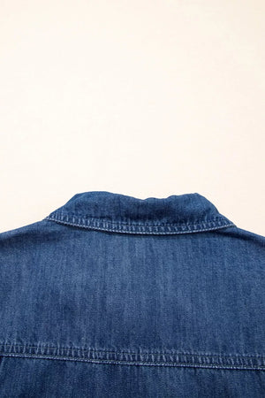 Blue denim collared mini shift dress with visible stitching detail.