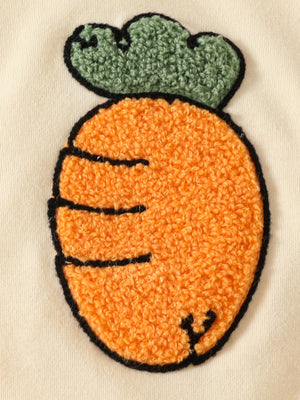 Baby set with textured orange carrot applique and green leaf detail.