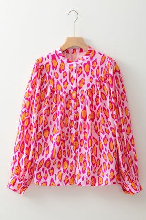 Pink leopard print blouse with balloon sleeves and button front.