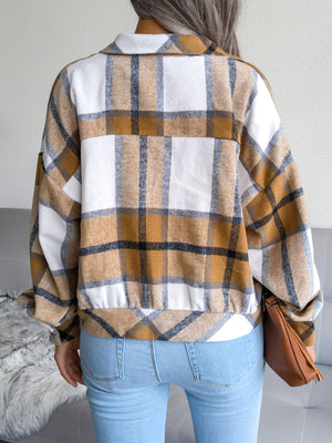 Oversized tartan shacket in camel and white with buttoned front and patch pockets.