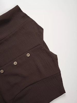 Chocolate cropped vest with textured fabric and button detail