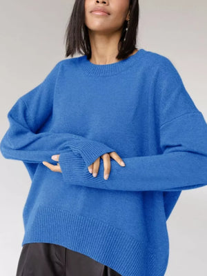 Soft knit sweater in bright blue with ribbed detailing and crew neck.