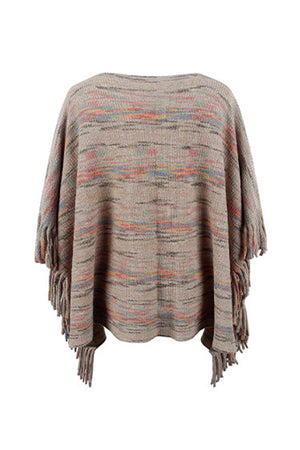 Multicolor knit poncho with fringe details and a striped pattern.