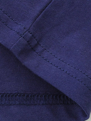 Navy blue 100% cotton t-shirt detail showing double-stitched seams and fabric texture.