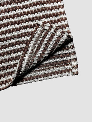 Maternity wide leg pants in dark brown and white waffle knit stripe fabric.
