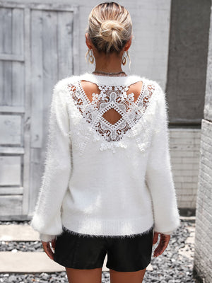 White fluffy knit sweater with intricate lace back detail
