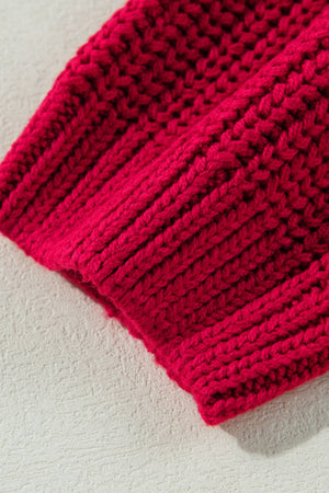 Deep red acrylic knit sweater with ribbed texture detail