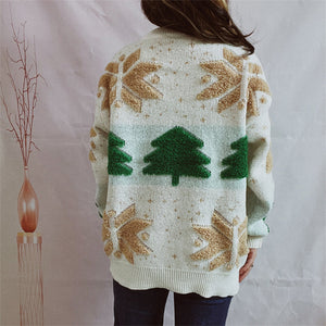 Cream knit sweater with festive Christmas tree and snowflake appliqués.