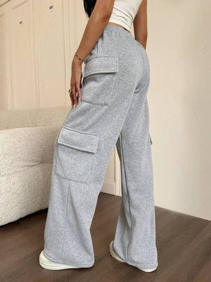 Gray relaxed fit cargo pants with drawstring and large side pockets