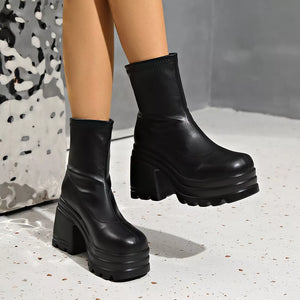 Black leather ankle boots with round toe and chunky platform heel