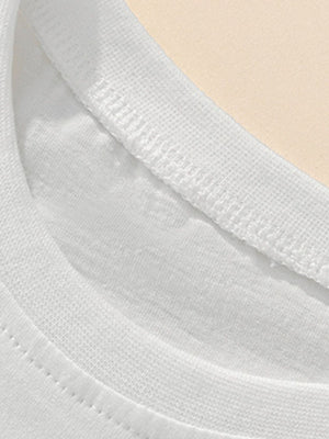 White cotton toddler tee neckline detail with visible stitching
