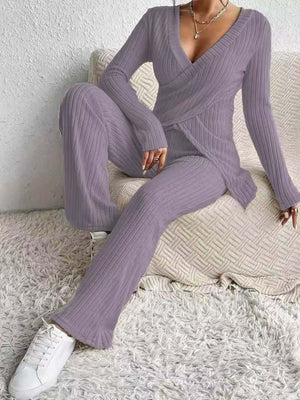 Lilac ribbed knit crossover lounge set with wide leg pants and long sleeves.