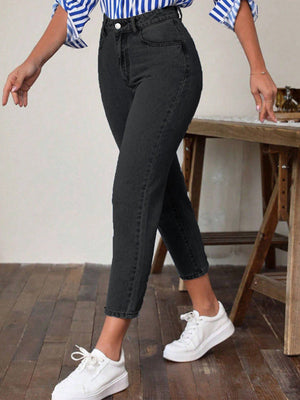 Black slim-fit ankle denim jeans with a modern silhouette.