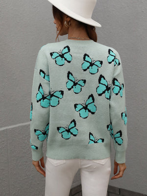 Sky blue knit crewneck sweater with allover butterfly motif.