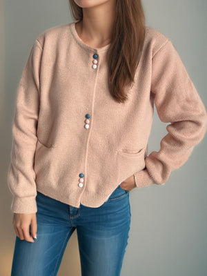 Dusty Pink ribbed knit button-up cardigan with colorful buttons and pockets