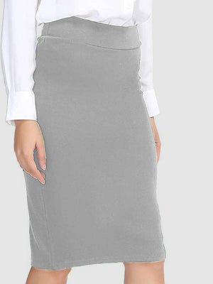 Gray pencil skirt with a high waist, styled with a white button-up shirt.