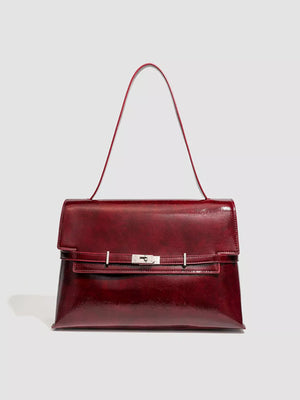 Elegant red pu leather shoulder bag with silver buckle detail
