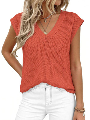 Textured apricot V-neck sweater vest with cap sleeves.