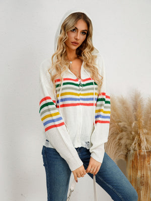 White knit zip-up hoodie with rainbow stripes and distressed details.