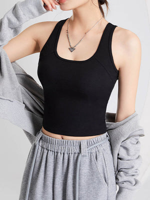 Black sculpted back crop tank with a scoop neckline and racerback detail.