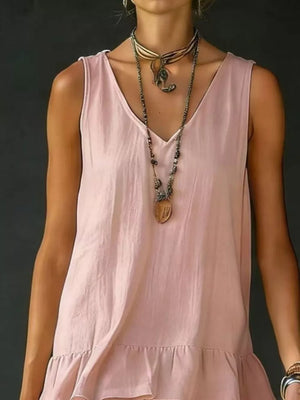 Pink tiered ruffled hem v-neck sleeveless dress with a relaxed fit.
