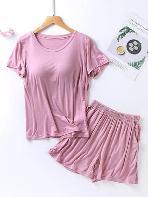 Pink short sleeve pajama set with shorts and pockets
