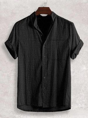 Black textured band collar casual shirt with cuffed short sleeves and a chest pocket.