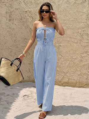 Blue striped strapless romper with smocked waist and tie front detail