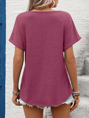 Pink relaxed fit t-shirt with cuffed short sleeves and a curved hem.