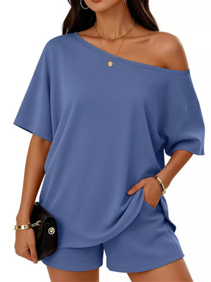 Blue boat neck tee and shorts set with off-the-shoulder styling and pockets.