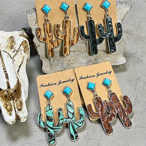 Turquoise cactus drop earrings with embossed detail in brown, teal, and black.