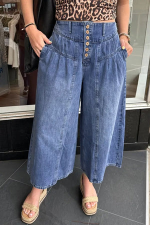 Maternity wide-leg jeans in blue denim with a button-fly and high waist.