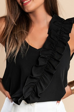 Black camisole with asymmetric ruffle strap detail and V-neckline.