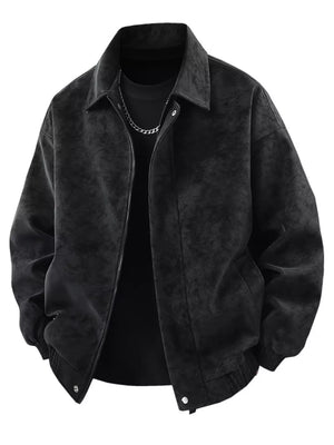Distressed faux leather zip jacket in black with a collared neckline and buttoned cuffs.
