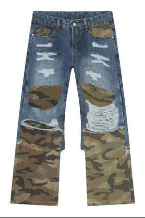 Camouflage patchwork distressed jeans in medium wash denim with baggy fit.