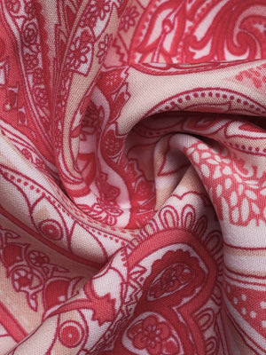 Paisley print smocked two-piece set fabric detail in red and beige.