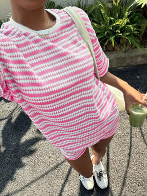 Pink striped relaxed fit two-piece set with a crew neck and short sleeves.