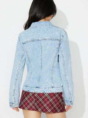 Light wash denim jacket with classic details and buttoned cuffs.