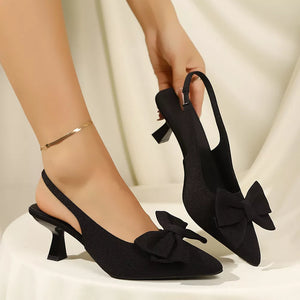 Elegant Bow Slingback Pumps in White, model styling view