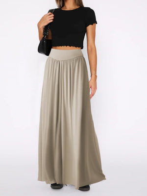Khaki jersey wide-leg trousers with drape-front and elastic waistband.