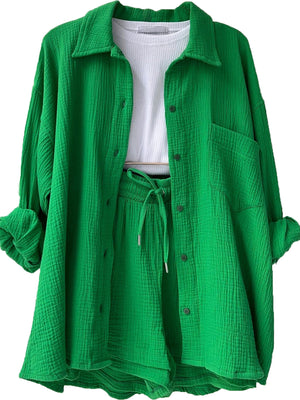 Green textured gauze shirt and shorts set with drawstring waist and button front.