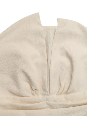 Cream pleated V-neck strapless romper with textured fabric detail