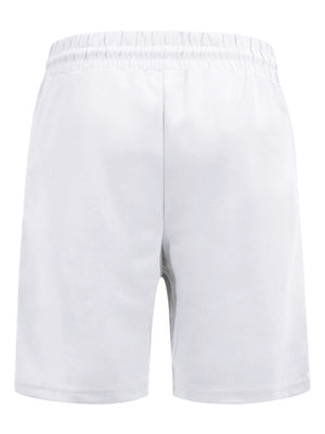 White pajama shorts with elastic waistband and drawstring detail.