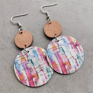 Cork & wood stripe disc earrings with colorful abstract pattern.