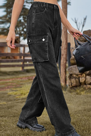 Black denim cargo pants with relaxed wide leg and utility pockets.