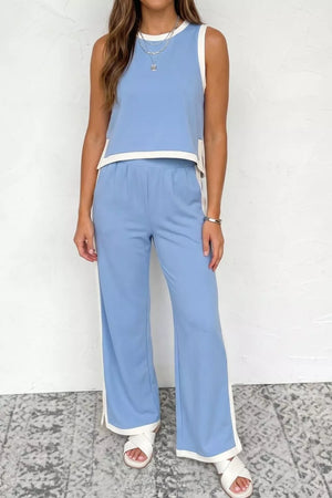 Light blue colorblock crop top and wide leg pants set with white trim.